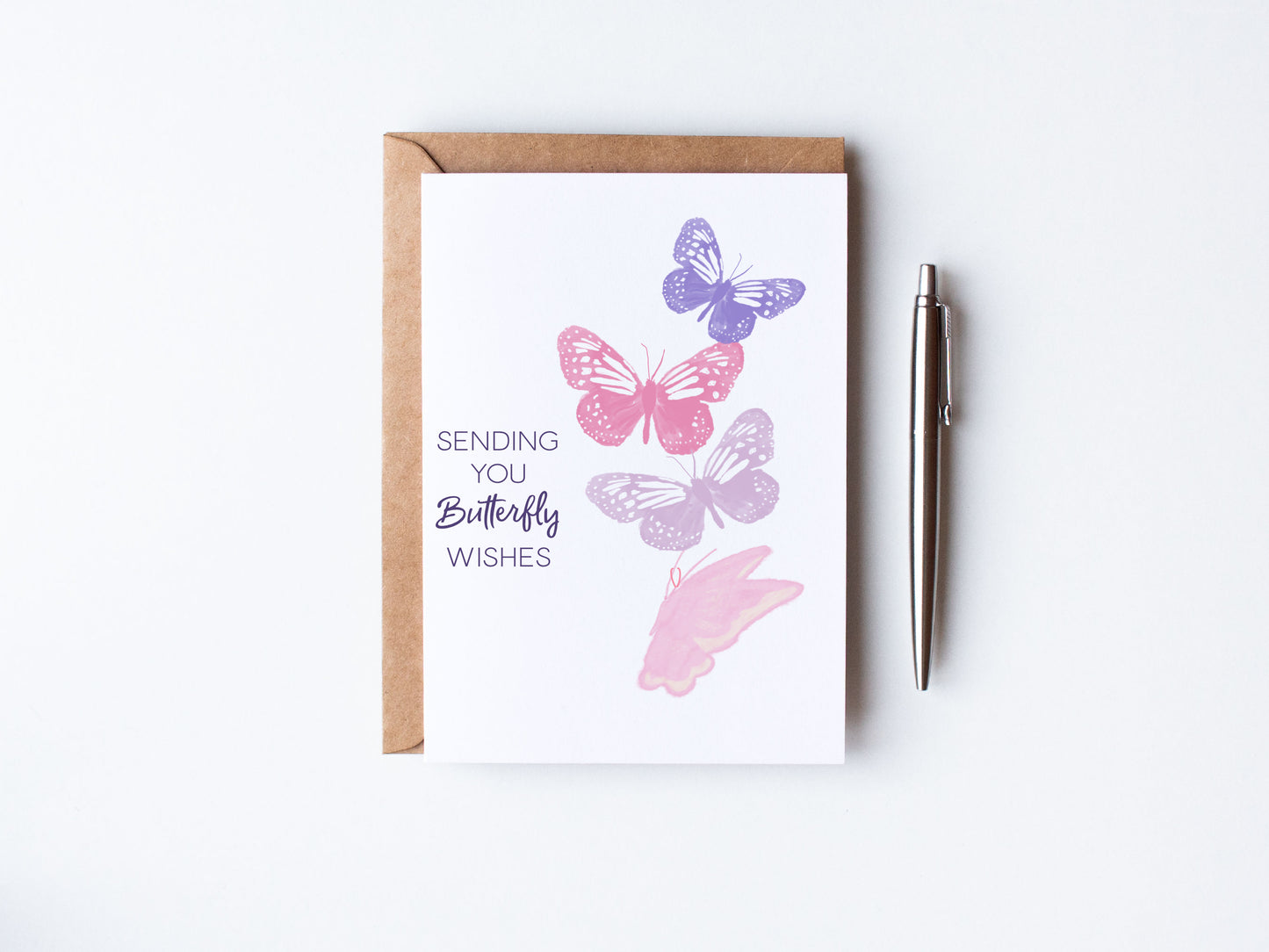 Pinks and Purple Butterflies over top a polka daot background - Sending you Butterfly Wishes