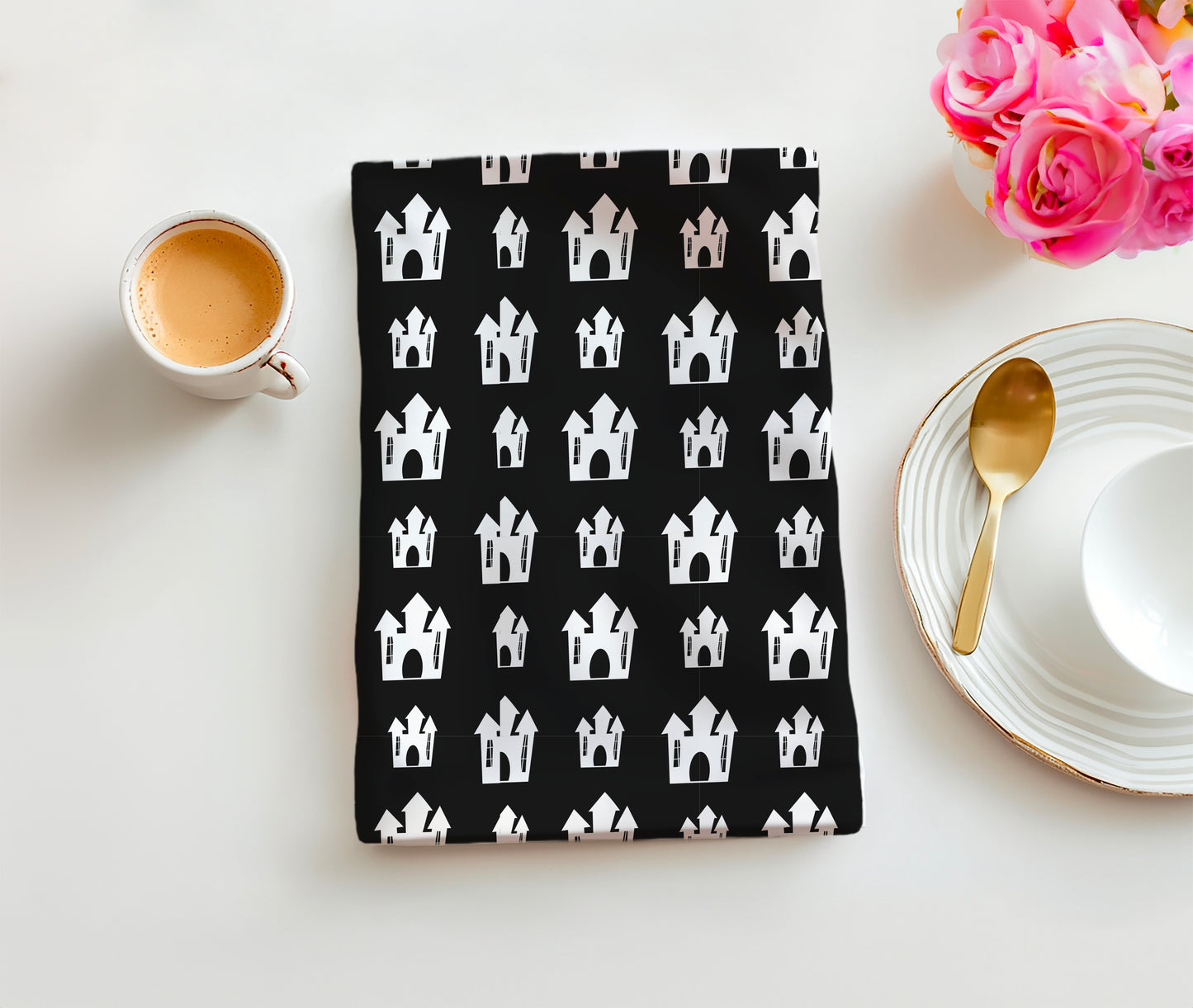 haunted houses on a black tea towel